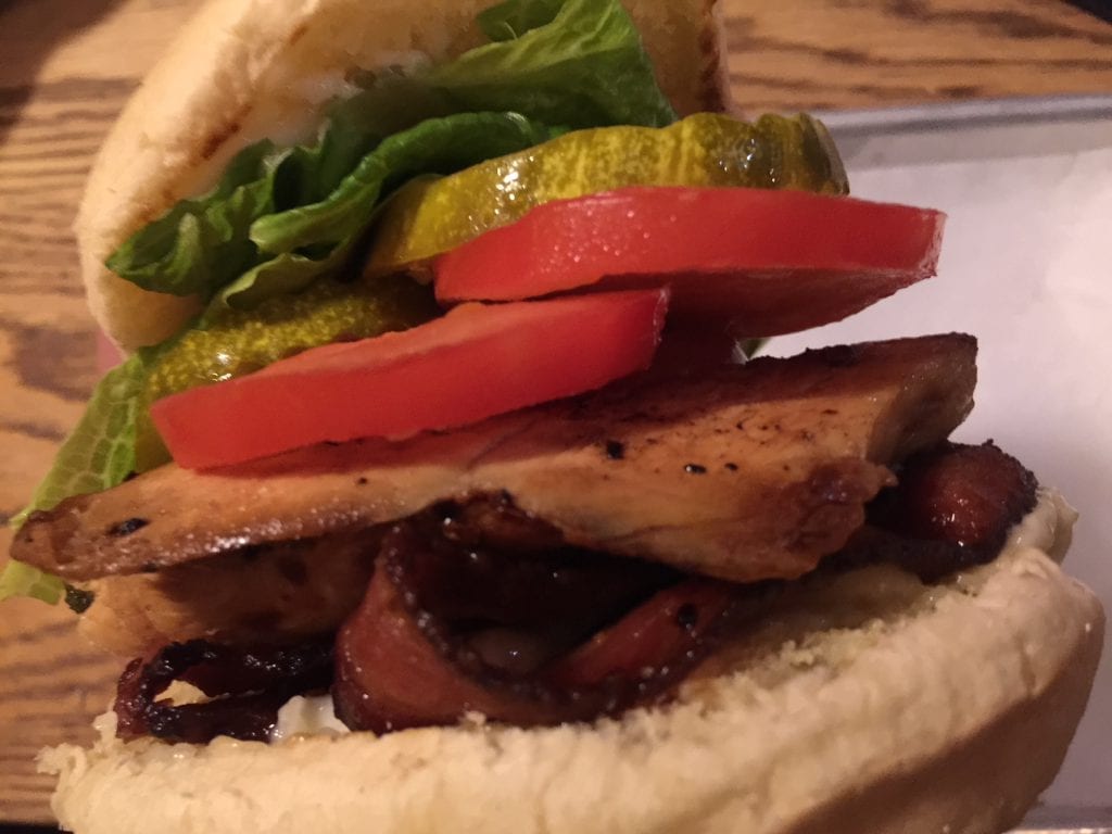 The Food Truck At Offshore Ale Restaurant: Chicken Sandwich with applewood smoke bacon, tomato, mayo, and pickles on a roll Oak Bluffs