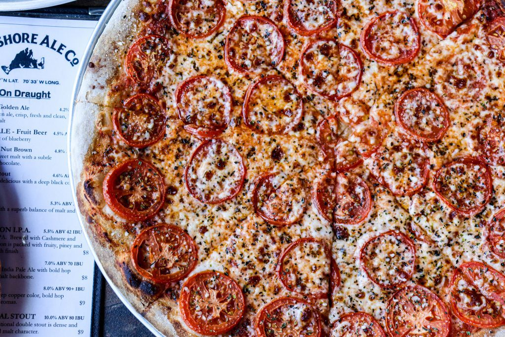 Top Ten Restaurants On Martha's Vineyard To Cozy Up To This Winter - Offshore Ale in Oak Bluffs Pizza from Offshore Ale